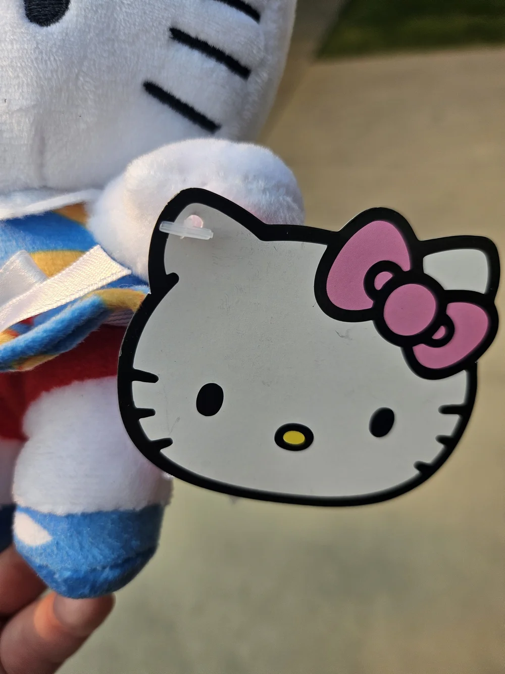Sanrio Hello Kitty White Plush with Blue Bow and Multicolor Dress